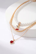 Cerise Driedelige Ketting Set met Parel en Hartenhanger